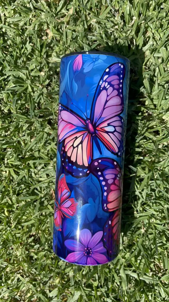 Stained glass effect butterfly sublimated onto a 20oz tumbler.