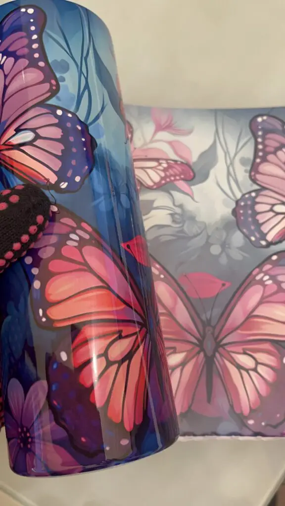 Revealing the butterfly design on sublimated 20oz tumbler