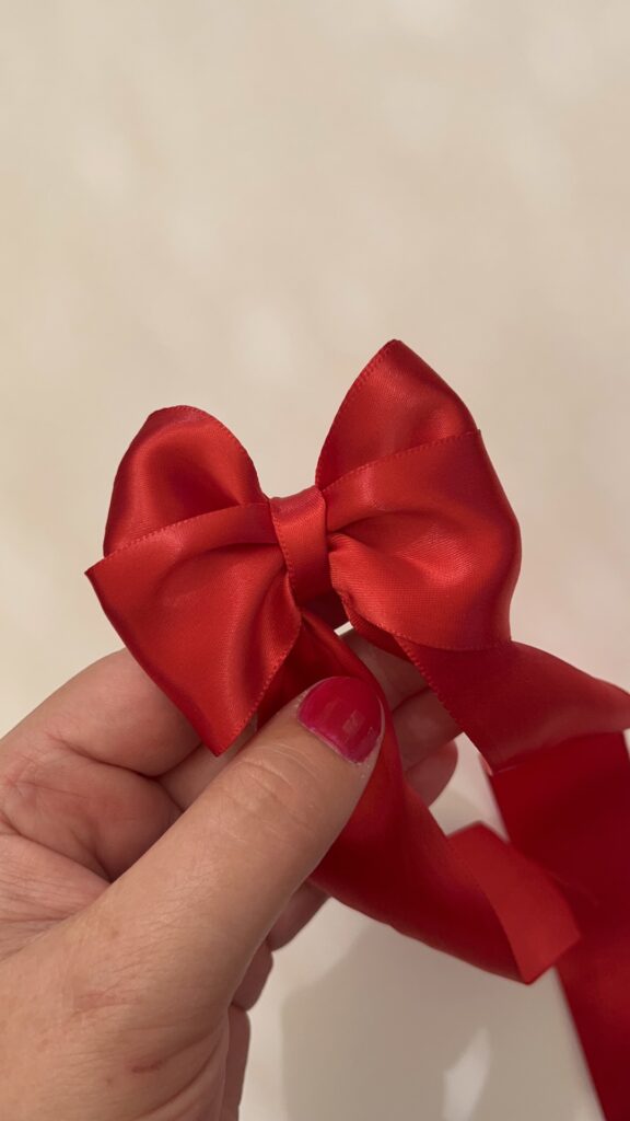 How To Tie A Decorative Bow With Ribbon