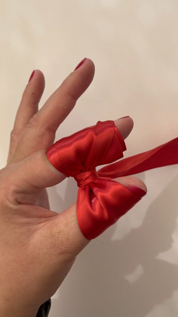 How to tie a bow with ribbon on a present